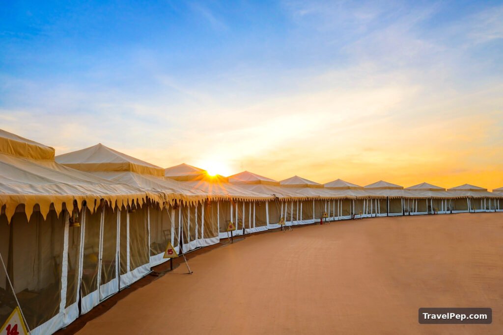 Rann Utsav 2026-27 at Dhordo: Dates, Tent City, Permit, and the Best Nights to Go 19 Row of Rann Utsav Tent City tents at sunrise